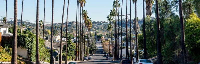 Street view of a modern storefront with clean signage and sidewalk access.